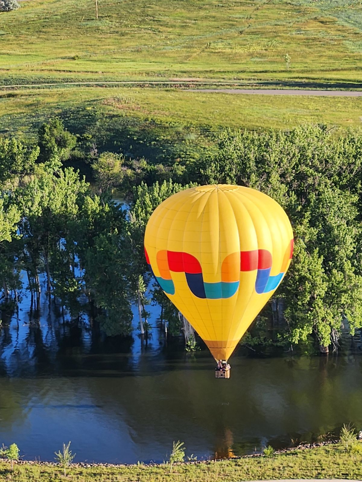 Hot Air Balloon Ride Over Lake