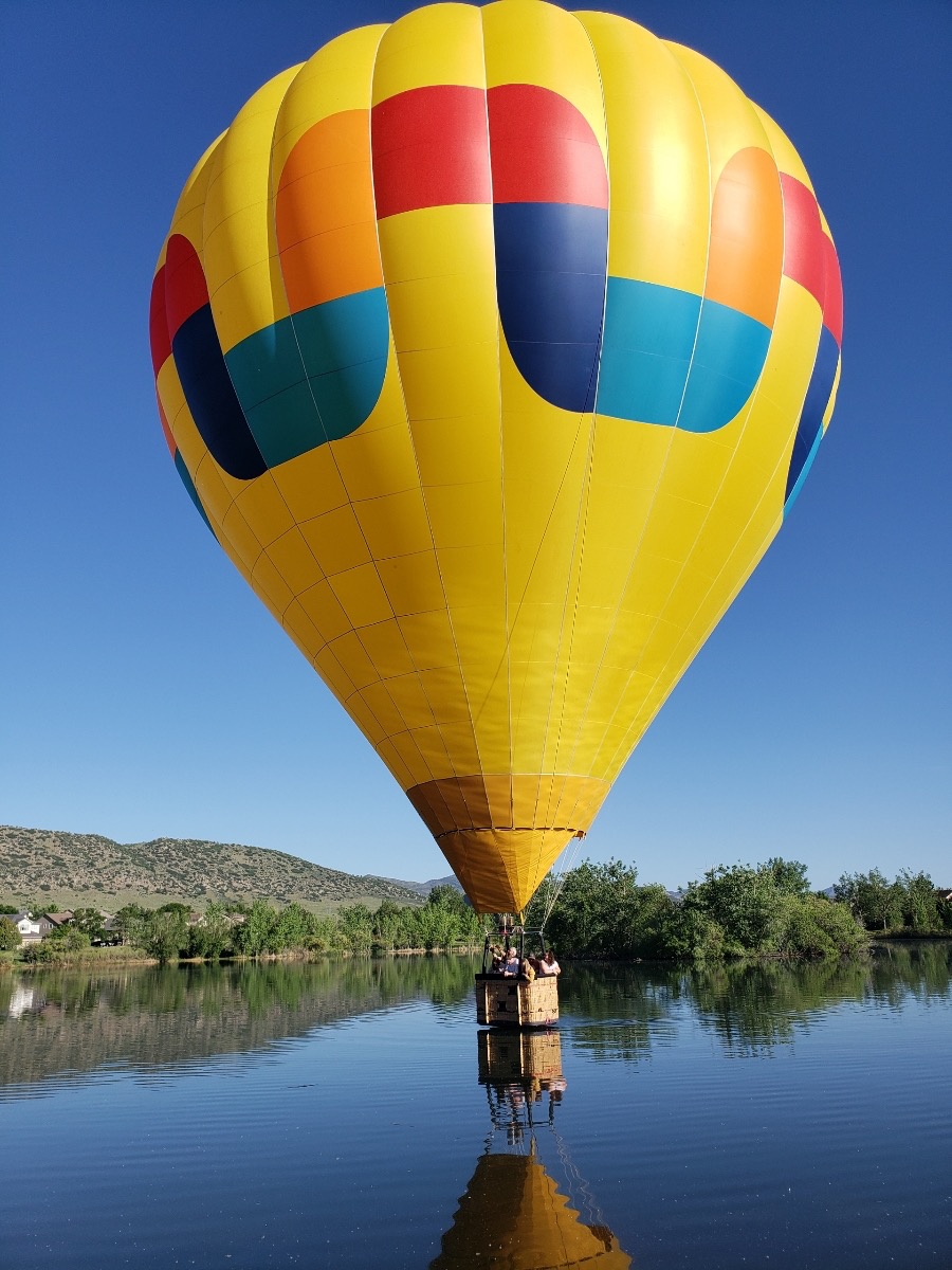Hot Air Balloon Ride Over Lake